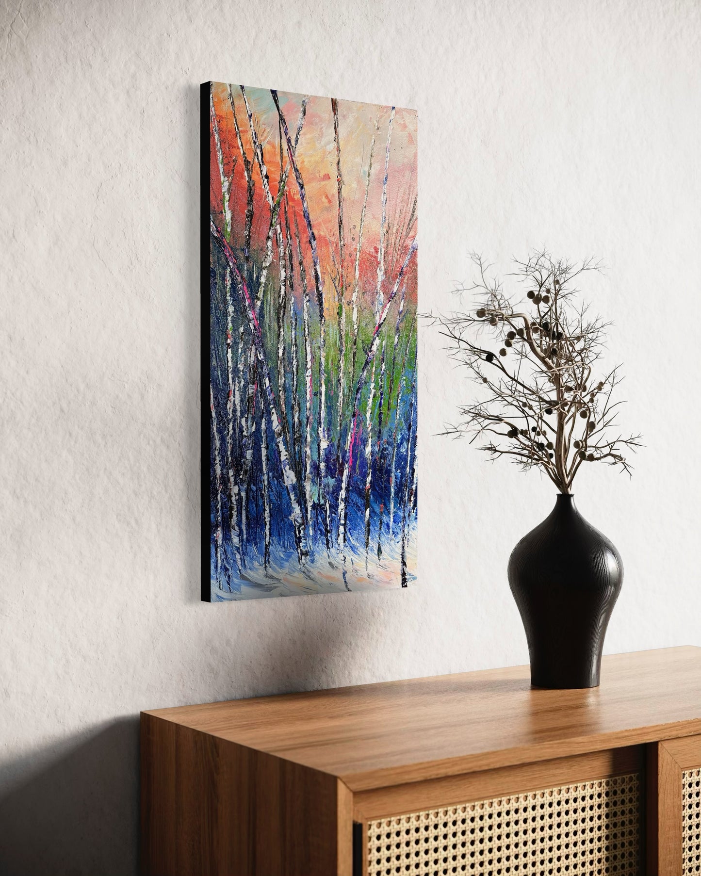 Abstract expressionism oil painting of birch trees in snow by artist Chelsea Tikotsky. This modern, painterly artwork features slender birch trunks set against a soft, snowy background, with expressive strokes and a blend of cool tones and subtle colors, evoking a serene, winter landscape. Perfect for art collectors or as a unique home decor piece, this painting brings a calming, nature-inspired feel with a touch of elegance and seasonal warmth to any interior space.