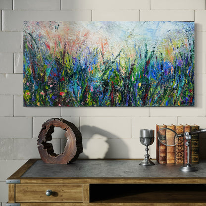 Abstract expressionism oil painting of fields of flowers by artist Chelsea Tikotsky. This contemporary piece features loose, painterly strokes with soft & rich, bold colors, creating a romantic feel. Inspired by nature & floral landscapes, this piece offers texture, movement, & depth, perfect for home decor or art collectors seeking unique abstract art. Ideal for a living room or bedroom space, this statement piece brings warmth, elegance, & a refreshing botanical essence into any interior design.