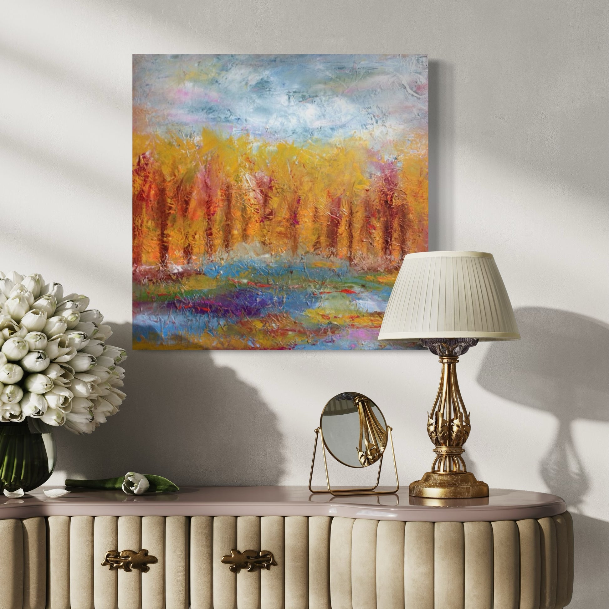 Medium abstract expressionism oil painting by Chelsea Tikotsky, showcasing vibrant fall colors with a blue sky and scenes of trees. The painting features rich oranges, golds, and ambers, with loose, painterly brushstrokes and plenty of texture that create dynamic movement and depth. This textured landscape captures the warmth and energy of autumn, making it a perfect addition for nature lovers or art collectors seeking a bold yet serene fall-inspired piece for their home or collection.