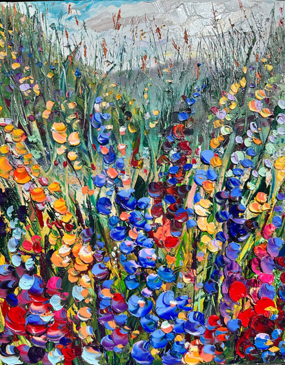 Abstract expressionism oil painting of fields of flowers by artist Chelsea Tikotsky. This contemporary piece features loose, painterly strokes with soft & rich, bold colors, creating a romantic feel. Inspired by nature & floral landscapes, this large piece offers texture, movement, & depth, perfect for home decor or art collectors seeking unique abstract art. Ideal for a living room or bedroom space, this statement piece brings warmth, elegance, & a refreshing botanical essence into any interior design.