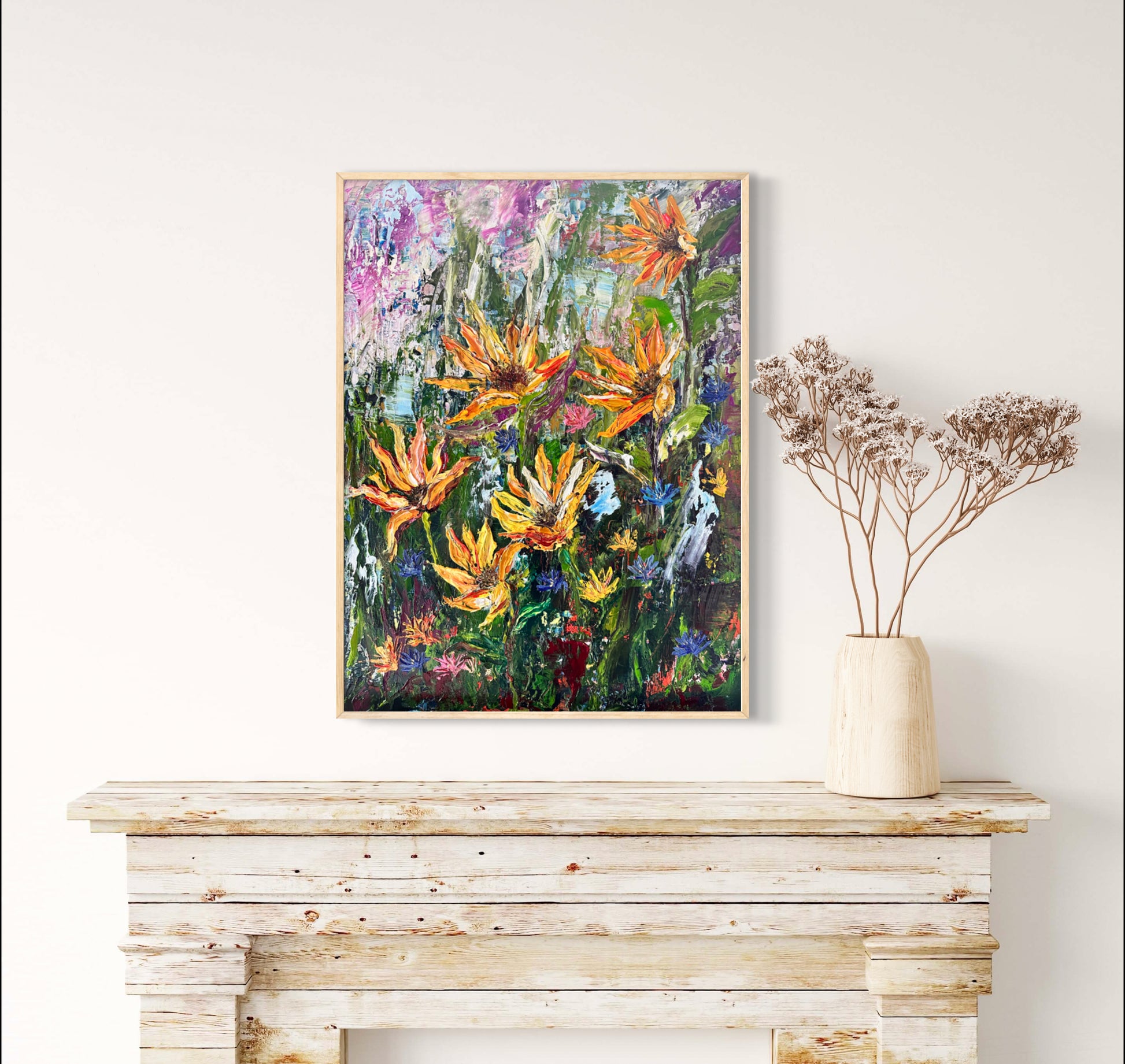 Abstract expressionism oil painting of vibrant sunflowers by artist Chelsea Tikotsky. This contemporary artwork features loose, painterly strokes with a blend of rich, bold colors, creating a romantic feel. Inspired by nature & florals, this large botanical piece offers texture, movement, & depth, perfect for home decor or art collectors seeking unique abstract art. Ideal for a living room, this statement piece brings warmth, elegance, & a refreshing botanical essence into any interior design