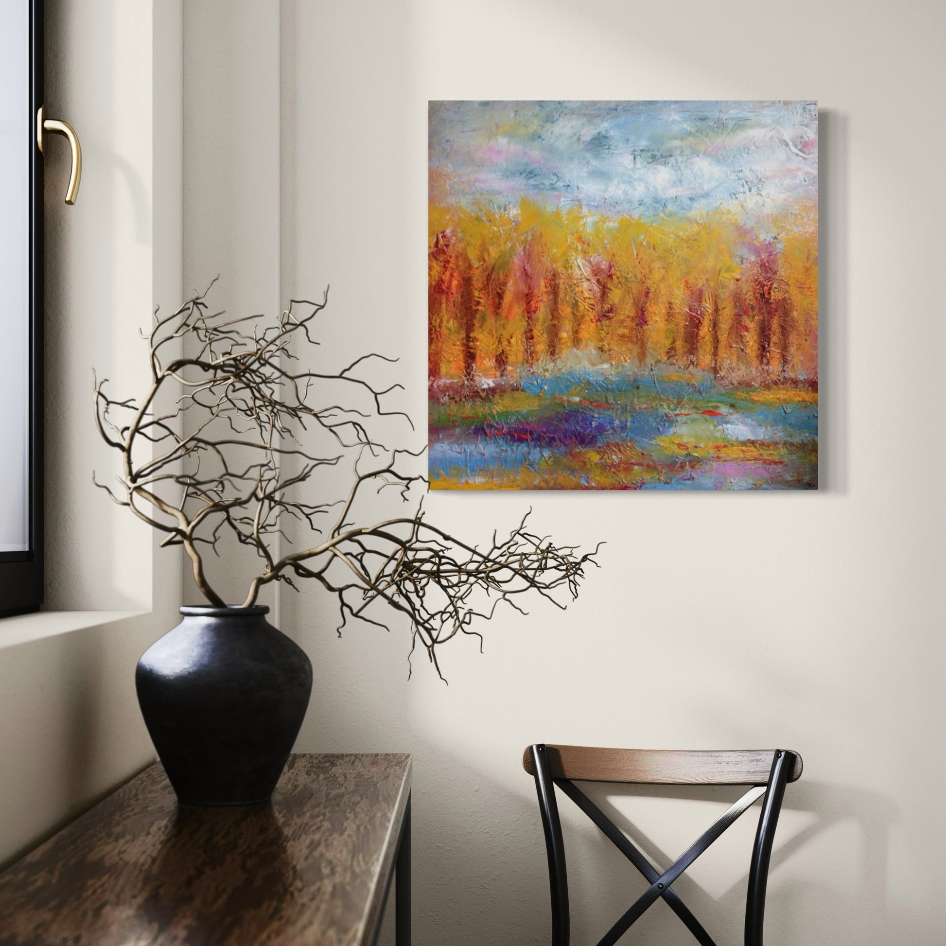 Medium abstract expressionism oil painting by Chelsea Tikotsky, showcasing vibrant fall colors with a blue sky and scenes of trees. The painting features rich oranges, golds, and ambers, with loose, painterly brushstrokes and plenty of texture that create dynamic movement and depth. This textured landscape captures the warmth and energy of autumn, making it a perfect addition for nature lovers or art collectors seeking a bold yet serene fall-inspired piece for their home or collection.