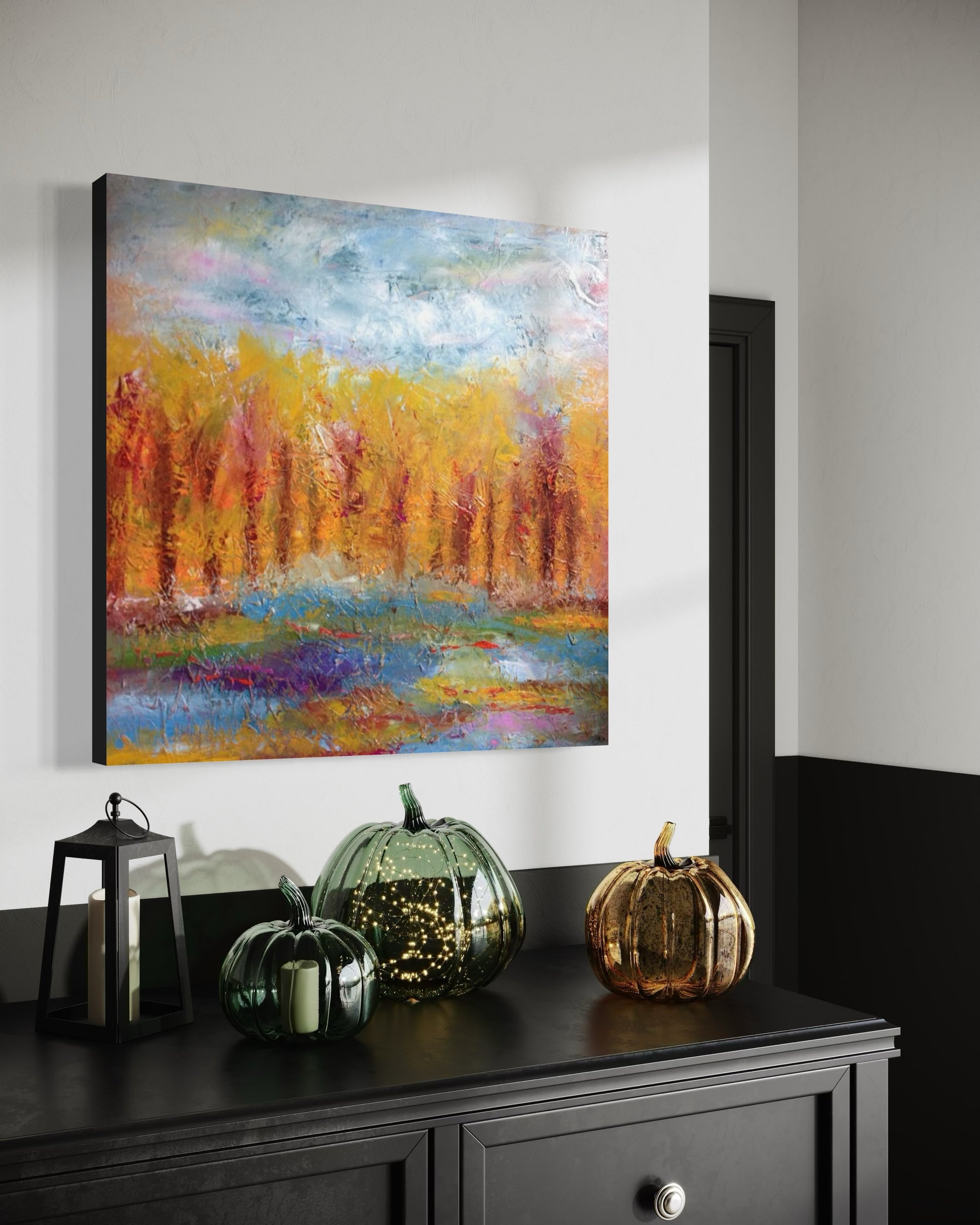 Medium abstract expressionism oil painting by Chelsea Tikotsky, showcasing vibrant fall colors with a blue sky and scenes of trees. The painting features rich oranges, golds, and ambers, with loose, painterly brushstrokes and plenty of texture that create dynamic movement and depth. This textured landscape captures the warmth and energy of autumn, making it a perfect addition for nature lovers or art collectors seeking a bold yet serene fall-inspired piece for their home or collection.