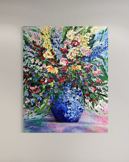 Manifestation Blooms, original contemporary floral painting by Chelsea Tikotsky featuring an abundant multicolored bouquet in a blue vase with richly textured palette-knife paint.