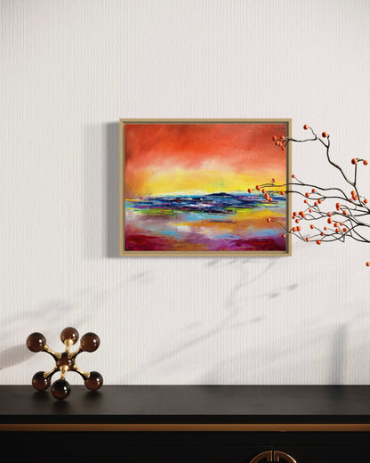 Abstract expressionism oil painting of a sunset reflecting on water, by artist Chelsea Tikotsky. This vibrant piece features bold reds, fiery yellows, and deep blues, with rich texture created through expressive brushstrokes and layering. The painting captures the dramatic glow of a setting sun as it reflects on the ocean, evoking warmth, movement, and serenity. Perfect for art collectors or as a striking accent in home decor, this textured sunset-inspired artwork adds energy and depth to any interior space