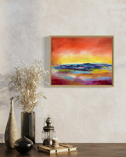 Abstract expressionism oil painting of a sunset reflecting on water, by artist Chelsea Tikotsky. This vibrant piece features bold reds, fiery yellows, and deep blues, with rich texture created through expressive brushstrokes and layering. The painting captures the dramatic glow of a setting sun as it reflects on the ocean, evoking warmth, movement, and serenity. Perfect for art collectors or as a striking accent in home decor, this textured sunset-inspired artwork adds energy and depth to any interior space